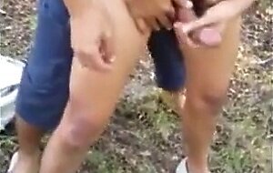 3 Asian boys having fun in woods (1'03'')