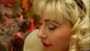 Vintage milf's blonde allure captivates in a daring sultry deal