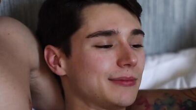 Handsome young guys have a sensual foreplay before fucking in a threesome