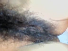 Asian girl is pantieless showing her very furry cunt nrh015 00