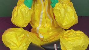 test gas mask in yellow hazmat suit