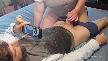 Liza give him an awesome handjob, then soaks him in his and her piss