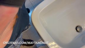Ginger jerks off in the bathroom at work