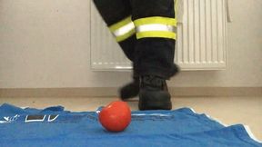 Firefighter stomping Tomatoes