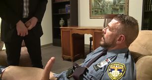 Cop with a huge nightstick has a shaved slut riding him