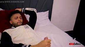 Camilo masturbating inside condom and eating cum