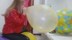 Alla does B2P of a 16" yellow balloon sitting on a beach ball and wearing leather leggings and a glossy down jacket!!!