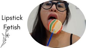 I paint my lips and suck on my lollipop