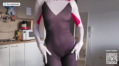 Blonde Gwen Stacy tries on a see-through Spider Girl costume while her kinky desires betray her