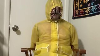 Pvc raincoat bondage part 2: yellow