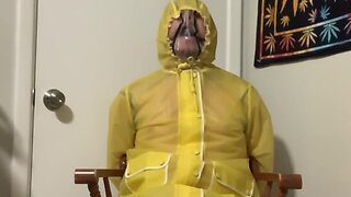 Pvc raincoat bondage part 2: yellow