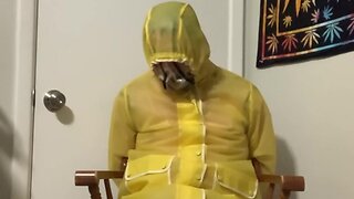 Pvc raincoat bondage part 2: yellow
