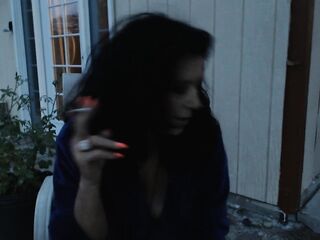 MAMMA SNEAKS outside to smoke in advance of sunrise