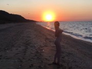 naked booty milf swimming in the sea sunset