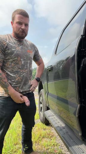 Country boy pisses on side of road