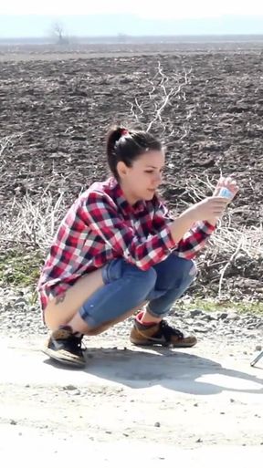 Desperate Girl with Full Bladder Has to Pee on a Dirt Road