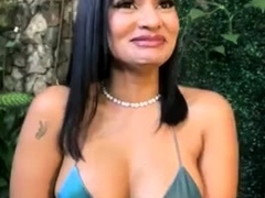 Busty babe playing with her big boobs
