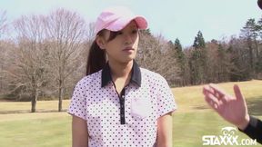 Asian golfer gets pounded on the green!