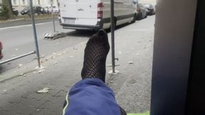 My feet in fishnet stockings