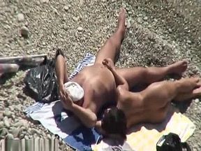 Fingering her tight little cunt outdoors