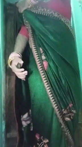 Indian Gay Crossdresser Gaurisissy in Green Saree Pressing Her Big Boobs and Fingering in Her Ass