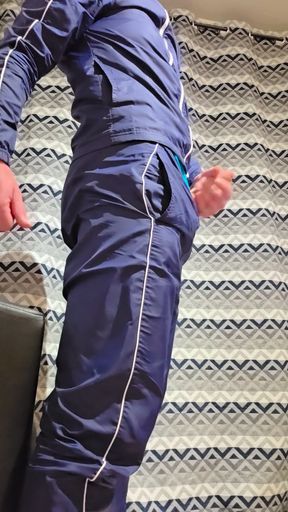 Handjob tracksuit nike in front of a porn movie