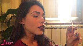 Smoking a cigar with gorgeous brunette chick