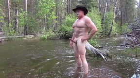 Naked bathing in the river.