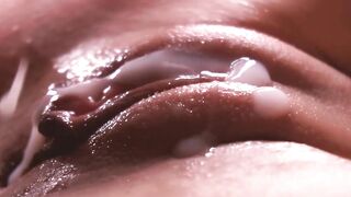 SLOW MOTION. Extremely close-up. Sperm leaking down the twat