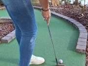 Pretty girl golfing in tight ripped jeans sfw