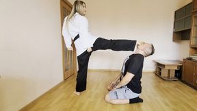 Karate girl showed that the slave's place is at her feet