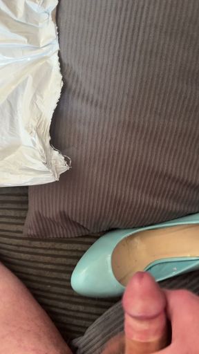 Cumming in pale blue patent heels