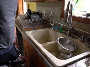 Bad boy refuses to piss in a proper toilet and empties his hot piss in kitchen sink