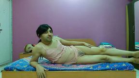 Sweet sissy crossdresser femboy Sweet Lollipop in a pink babydoll with a thong.