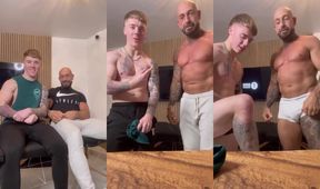 Flexing after gym with a bald tattooed muscle daddy