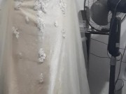 Crossdresser wearing bridal dress