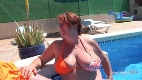 Posh Busty Cougar Jojo Seduces a Stud at the Pool