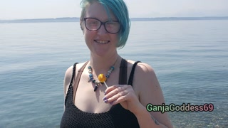 Seattle Ganja Goddess the Queen of Pussy Pops sucking lollipops: Cemetery Halloween licking candy