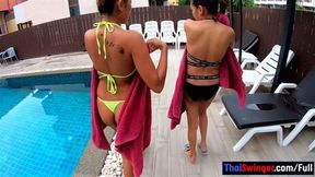 Bisexual amateur Thai girls in a threesome with big white cock