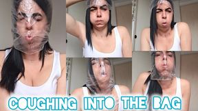 Coughing into the bag!