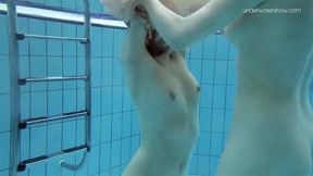 Two hot hairy beauties underwater