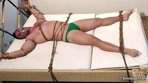 Peter bound and gagged in speedo | Behind the Scenes