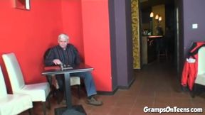 Barmaid Enjoys Reverse Cowgirl with Older Patron in Public Setting