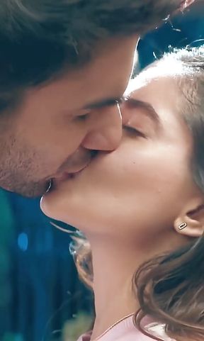 Desi couple shares a kiss in Bollywood style