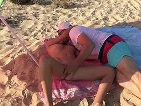Gangbang with fucking on the beach. Blonde and 4 guys.