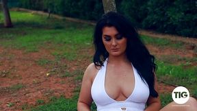 Busty brunette MILF Ashleigh Gee shooting in sexy white dress