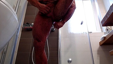 Fucking my hairy, muscled ass in the shower makes my muscled body shake
