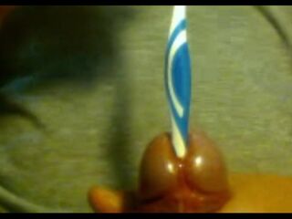 Urethral insertion with toothbrush