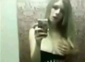 Skiny long haired blonde teen strips and fingers pussy