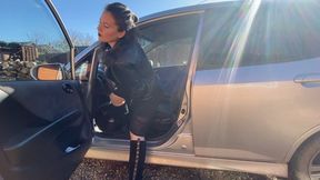 lady in black suede boots pedal pumping and smoking in the car